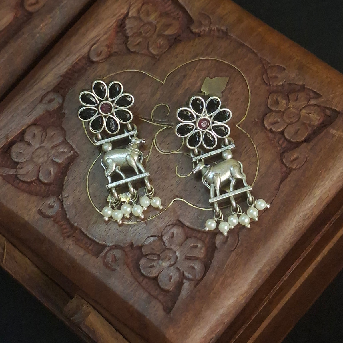Black stone nandi earrings