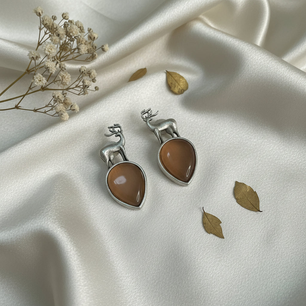 Hiran Motif Brass Earrings